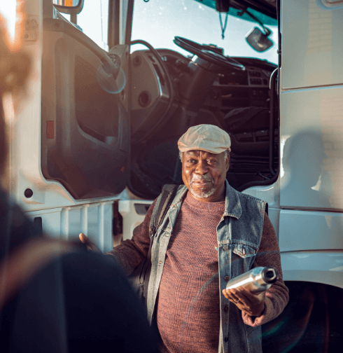 man next to truck
